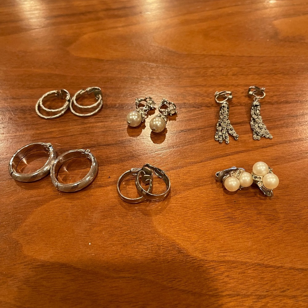 6 pair silver clip on earrings